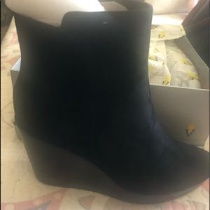 Black wedge booties